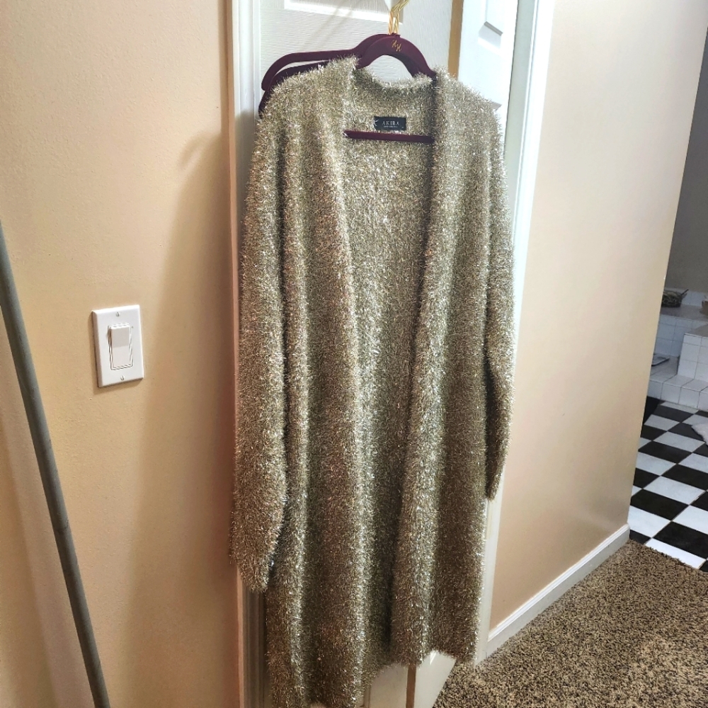 Long sparkly sweater.  Light gold metallic l/m new